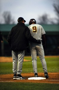 On-base coaching for the Minnesota college baseball team