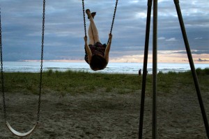 swinging at seaside